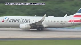 Tires catch fire moments before takeoff on American Airlines plane