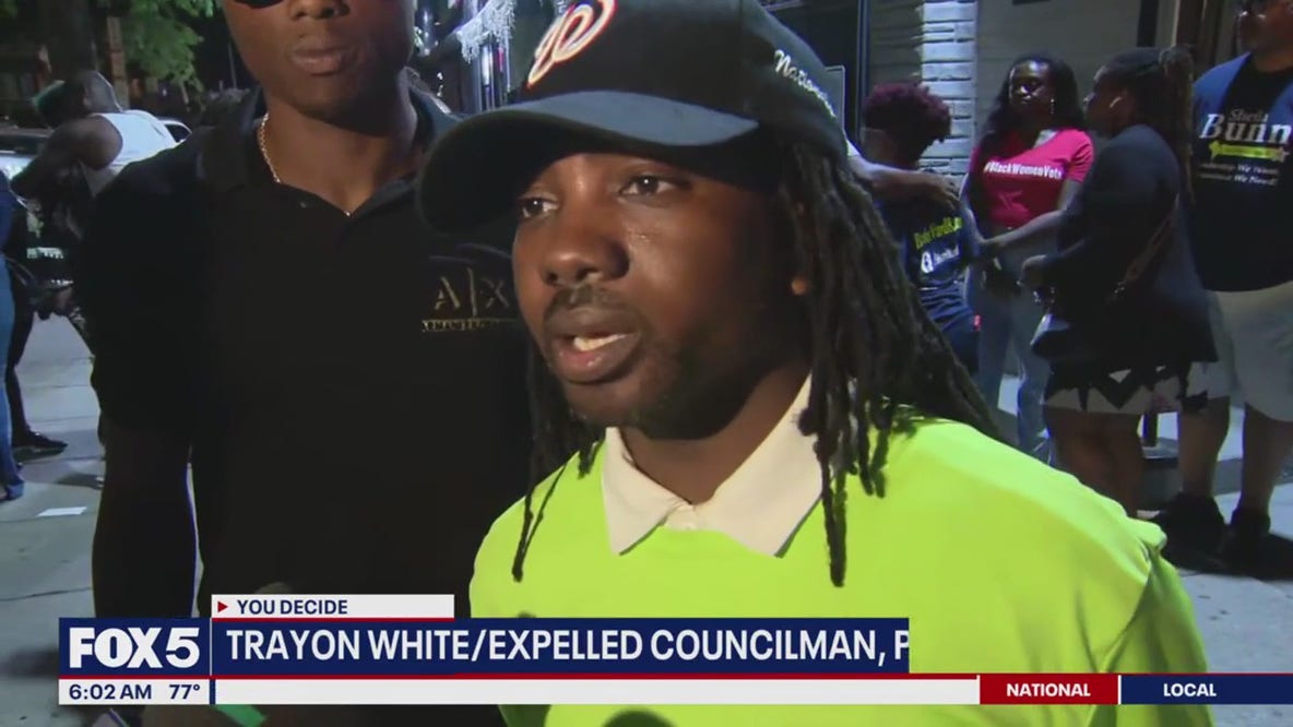 Trayon White celebrates with supporters