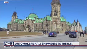 Automakers halt shipments to US