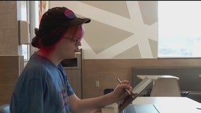 McDonald's worker with disability breaks barriers with art