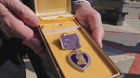 Illinois treasurer returns Purple Heart to daughter of late WWII veteran