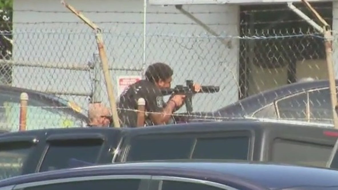 SWAT standoff at Marietta auto shop