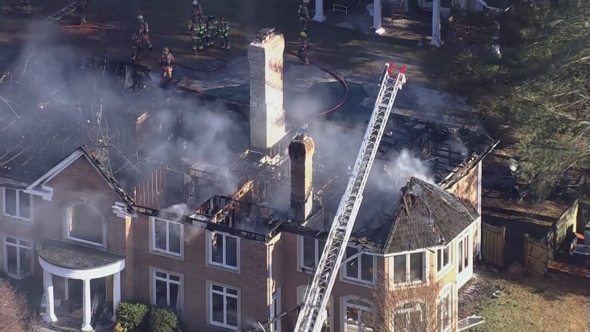 Fire rips through Maryland mansion; crews battle flames