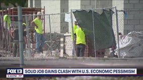 Solid job gains clash with U.S. economic pessimism