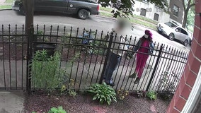 Armed robbery of Chicago postal worker caught on video