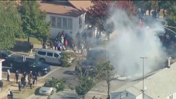 Federal agents clash with residents on Chicago's East Side