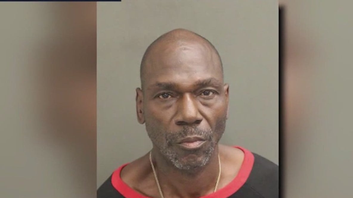 Suspect accused of attacking a woman in home invasion