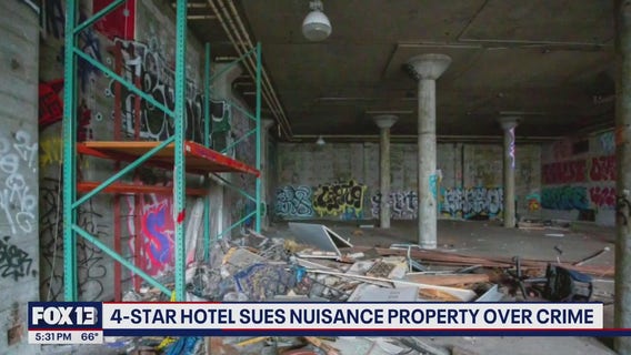 Seattle hotel blames abandoned building next door for crime, fires, guest complaints
