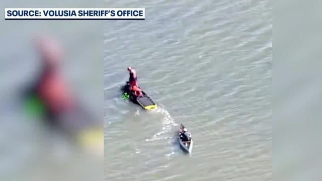 Video: Florida officials rescue canoer who overturned and lost his paddle