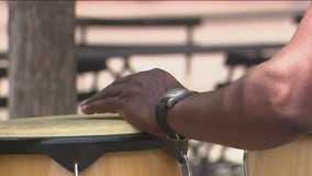 Community activist Dr. Michael James performs African Drum Salute in honor of Juneteenth