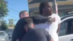 LAPD cop punches handcuffed man in South LA