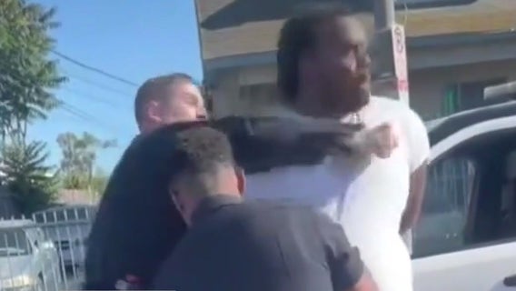 LAPD cop punches handcuffed man in South LA