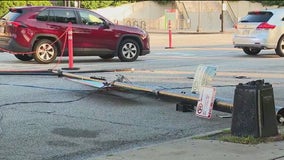 Downed power lines block traffic on Columbus Drive near Grant Park