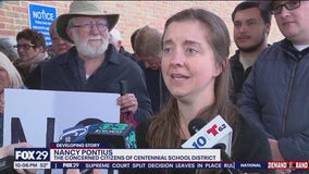 Group holds protest outside meet and greet with Centennial School District candidate