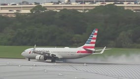Video: Smoke seen shooting from plane at Tampa International Airport moments before take-off