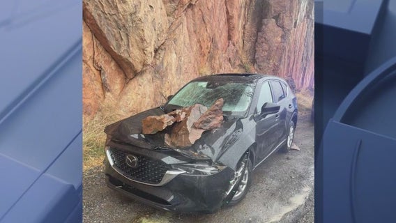 Boulder falls on Arizona tourists' rental car