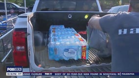 Folks stock up on water, fans to beat the heat