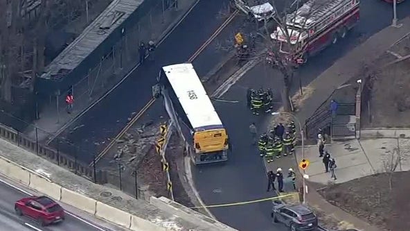 Bus hangs off overpass in New York City