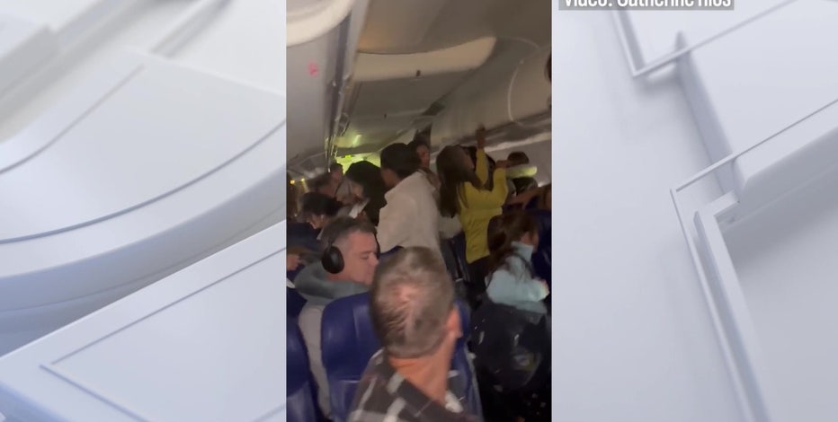 Two injured after cell phone battery sparks fire on Southwest flight in Denver