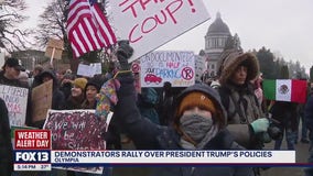 Demonstrators rally in WA over Trump's policies