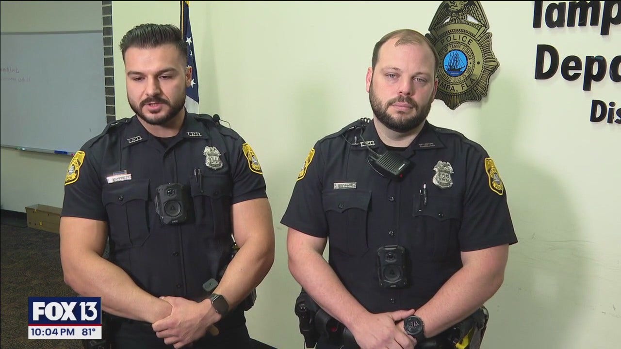 Officers save woman from burning car | FOX 13 Tampa Bay