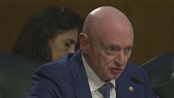 Sen. Mark Kelly grills Tulsi Gabbard on Snowden