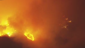 Fire approaching buildings in Malibu