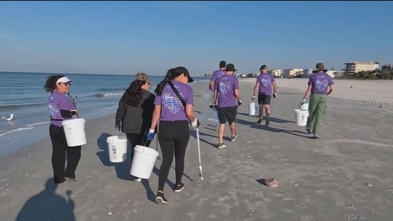 Clearing litter and debris from Pinellas beaches