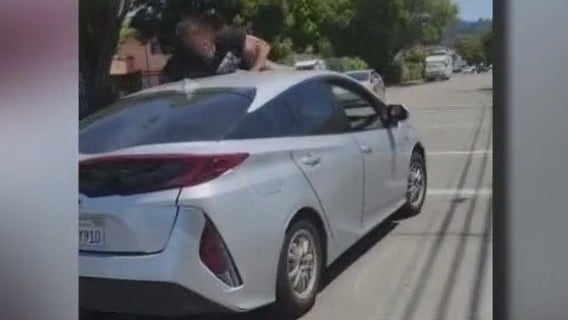 Video: Man seen clinging to car roof after confrontation with driver in Berkeley