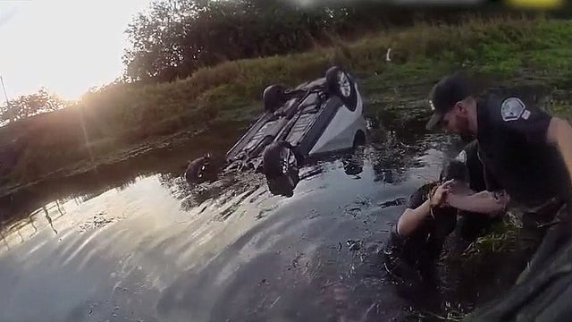Pregnant woman rescued from sinking car by Palm Bay police officers: 'Literally went into life-saving mode'