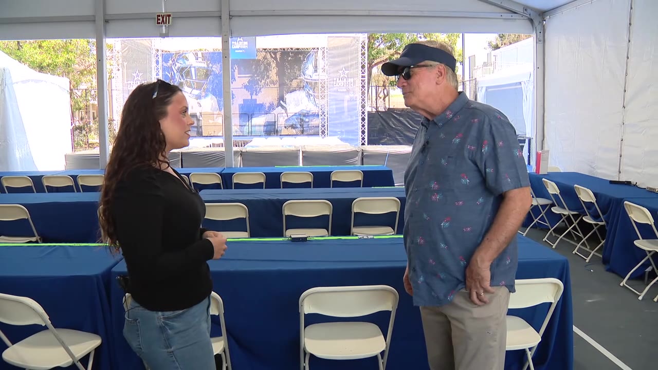 Mike gives Sam a tour of Cowboys camp