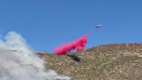 Wildfires continue to burn across western US