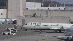 Air traffic controllers holding information picket