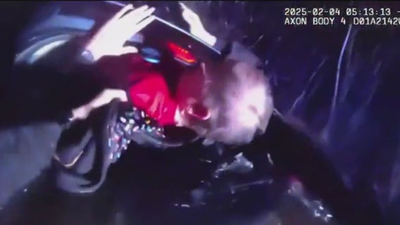 Marin County sheriff breaks car window to rescue woman in flooding creek: video