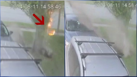 WATCH: Possible lightning bolt causes spark, dirt explosion outside Florida home