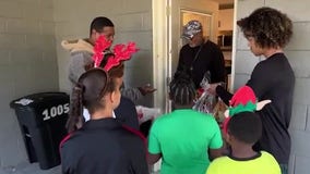 Meals on Wheels volunteers deliver food and gifts