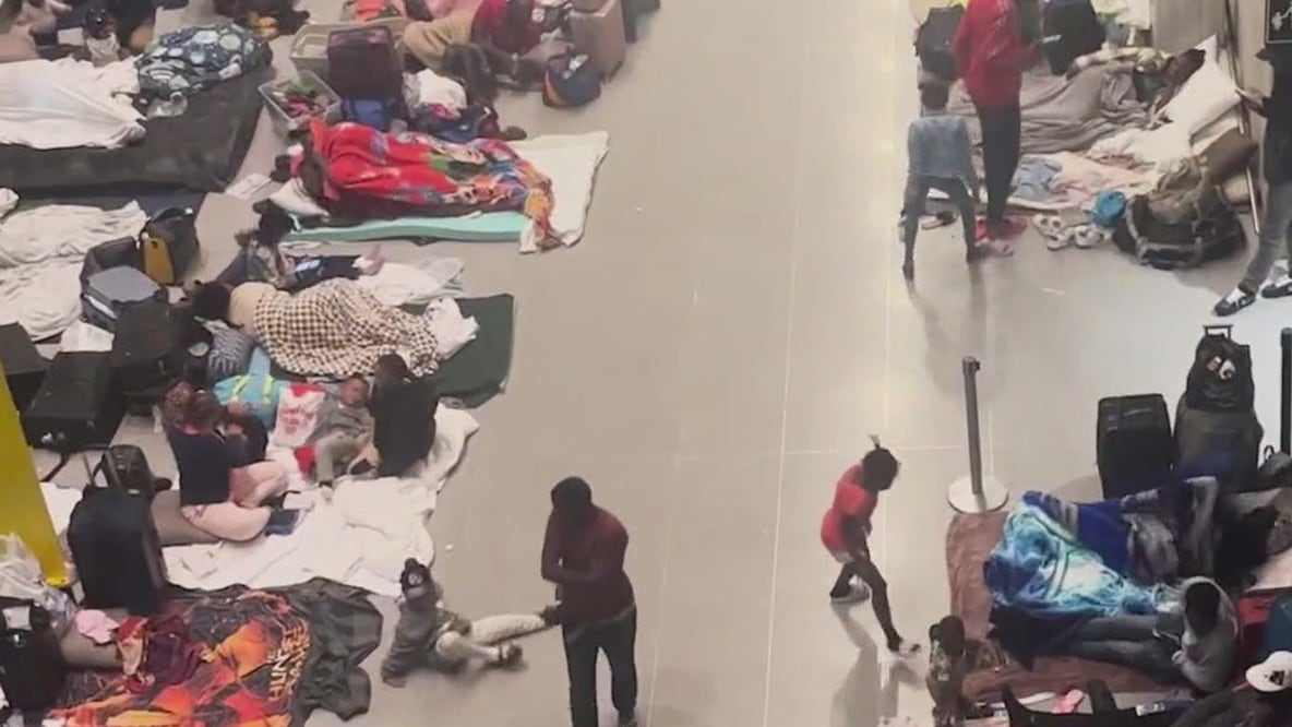 Migrants sleeping in Boston Logan airport