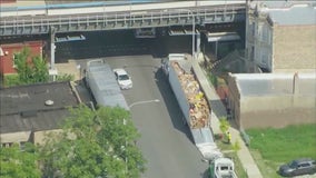 UPS truck looted after roof peeled off during crash