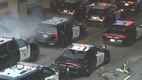 Driverless Waymo cars, police cruisers lit on fire