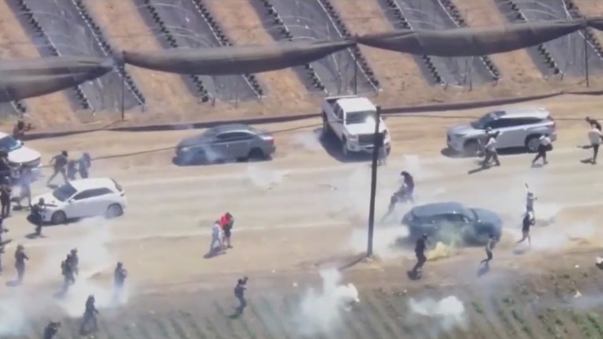 Immigration raid leads to standoff between ICE and protesters