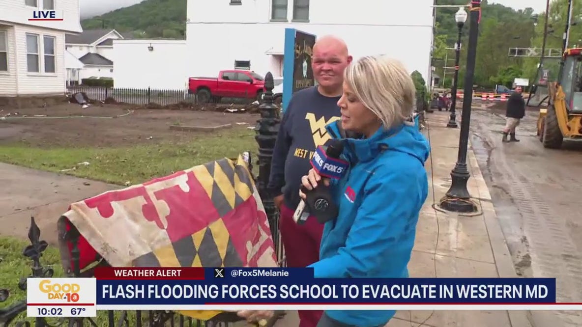 Maryland community unites after floodwaters leave town buried in mud