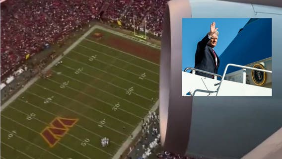 Trump arrives at Commanders game in Air Force One