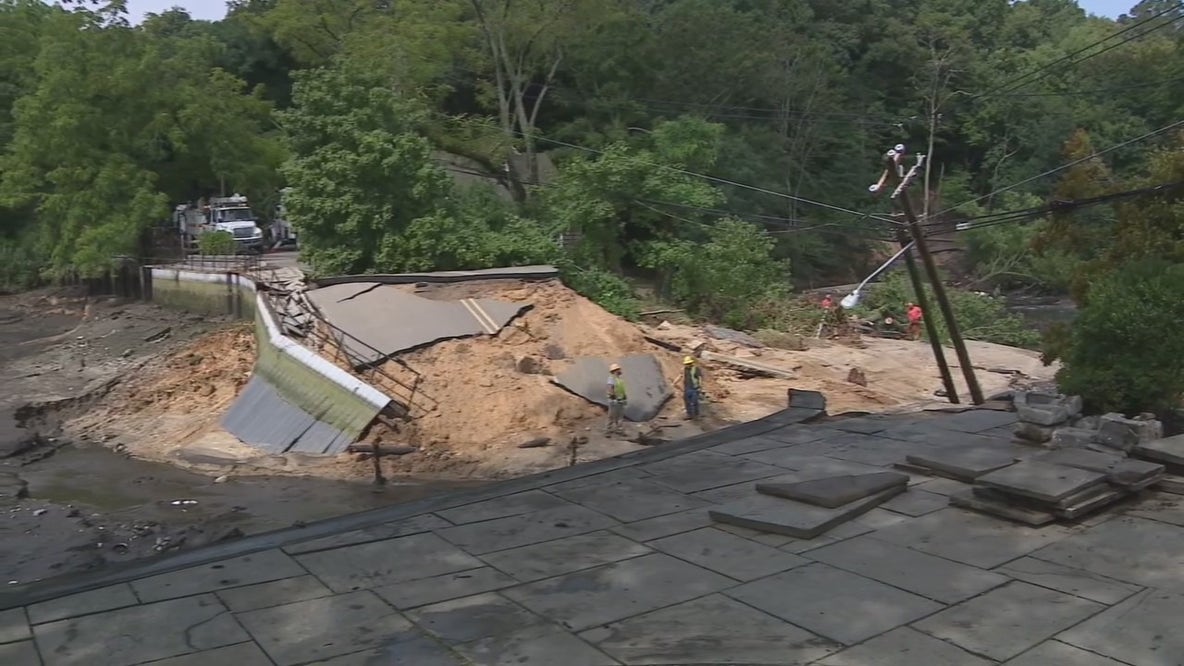 Long Island floodwaters collapse road