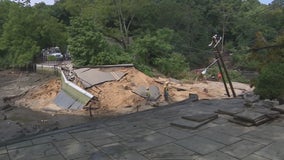 Long Island floodwaters collapse road