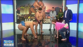 Sumo wrestling lesson with all-star champs
