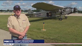 Fox 2 flies in a 1928 Ford Tri-Motor airplane from the Liberty Aviation Museum