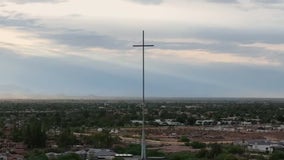 Crews work to take down spire from Valley church