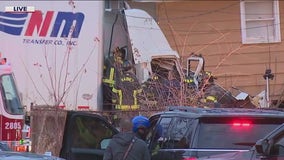 Semi-truck crashes into south suburban home, prompting large police response