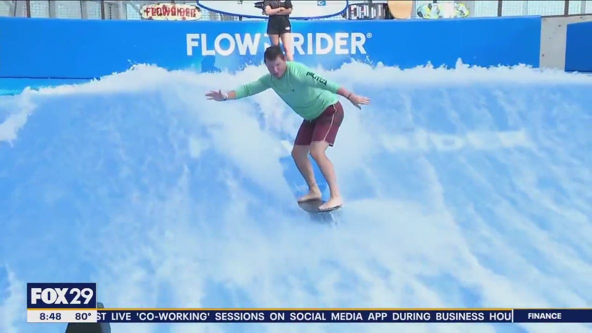 Richard tries the Flowrider surf simulator at Island Waterpark