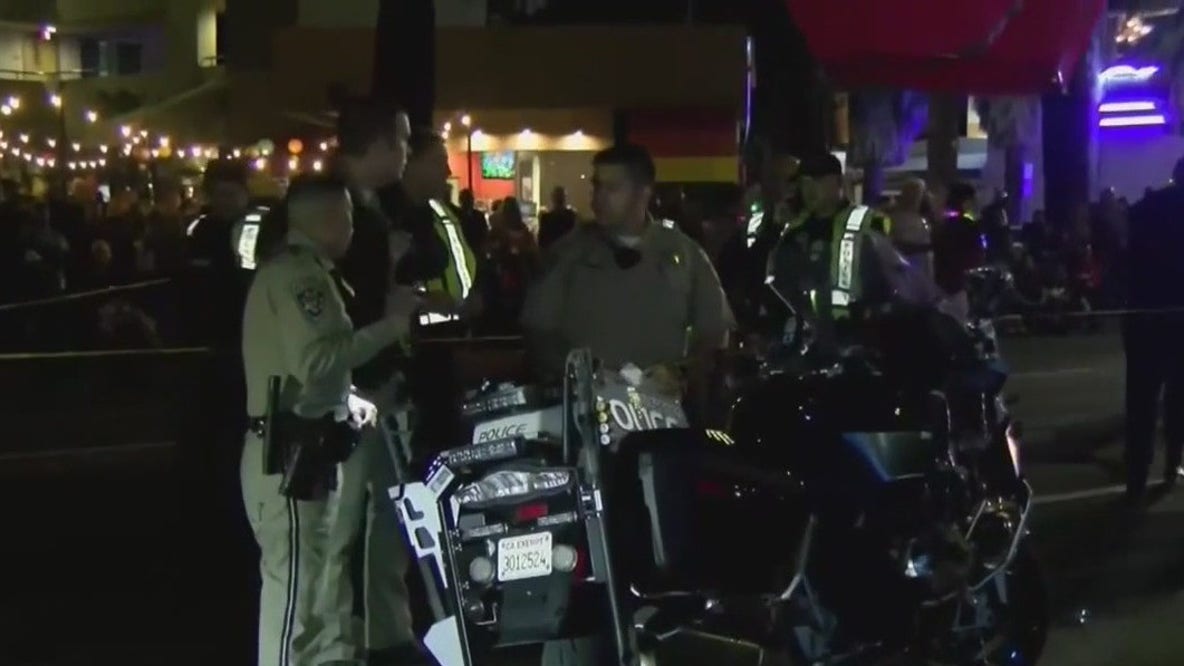 Cop crashes into crowd at Christmas parade